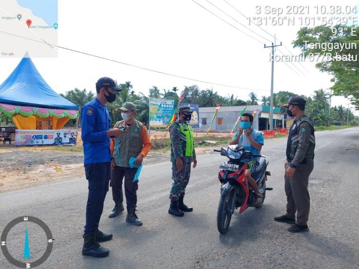 Putus Covid 19, Serda Ode K Bersama Tim Gabungan Giat Lakukan Patroli di Pos PPKM 
